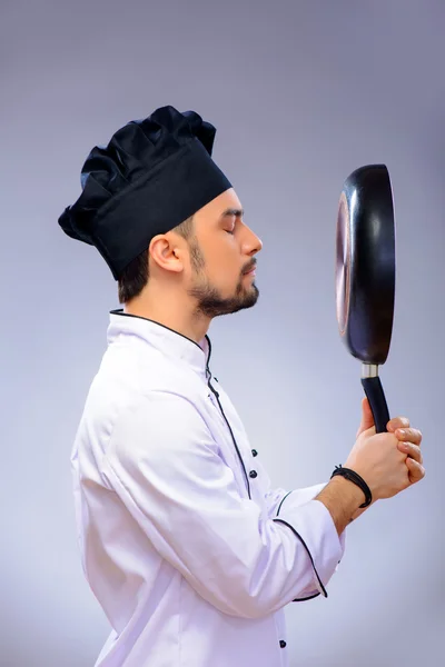 Portrait of young handsome cook — Stock Photo, Image