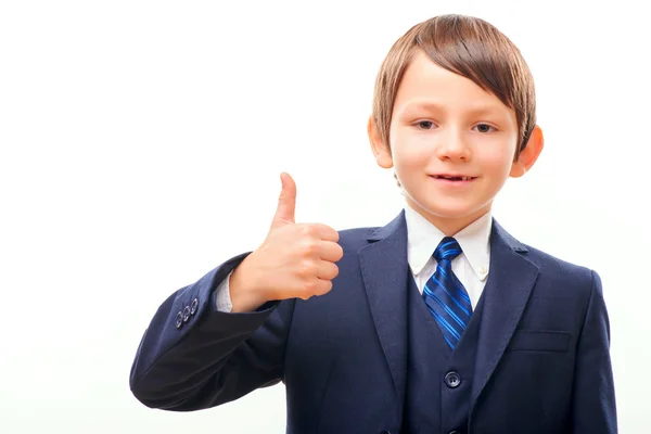 Business child in suit and tie showing his thumb up — Stock Photo, Image