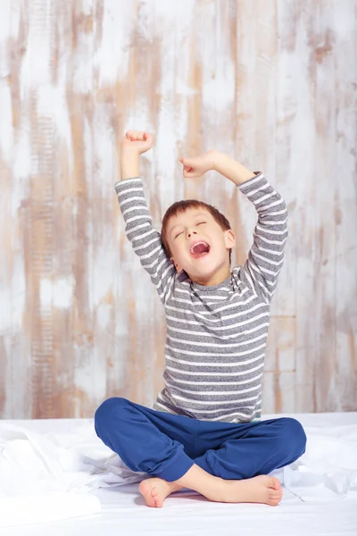 Little boy stretching in the morning — Stock Photo, Image