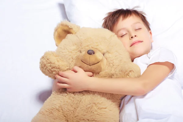 Portrait of a boy sleeping with teddy bear — Stock Photo, Image