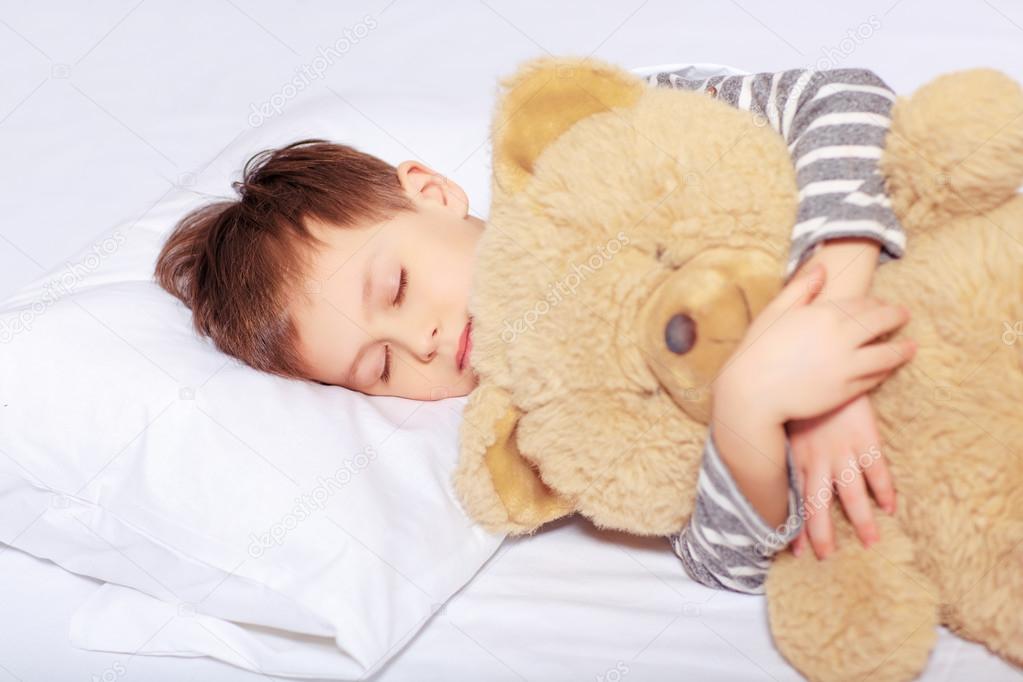 sleeping with teddy bear