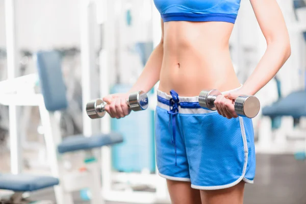 Beautiful girl in sports club — Stock Photo, Image