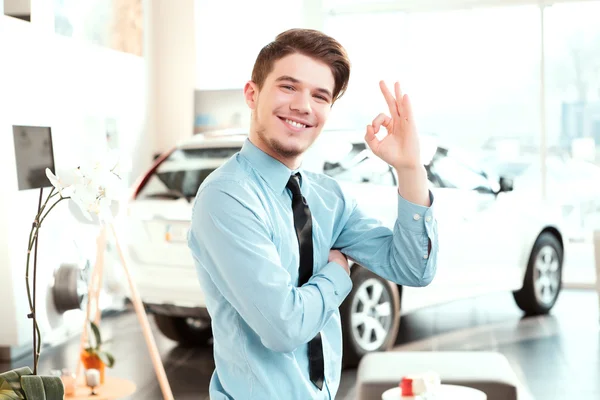 Car sales man in formalwear — Stock Photo, Image