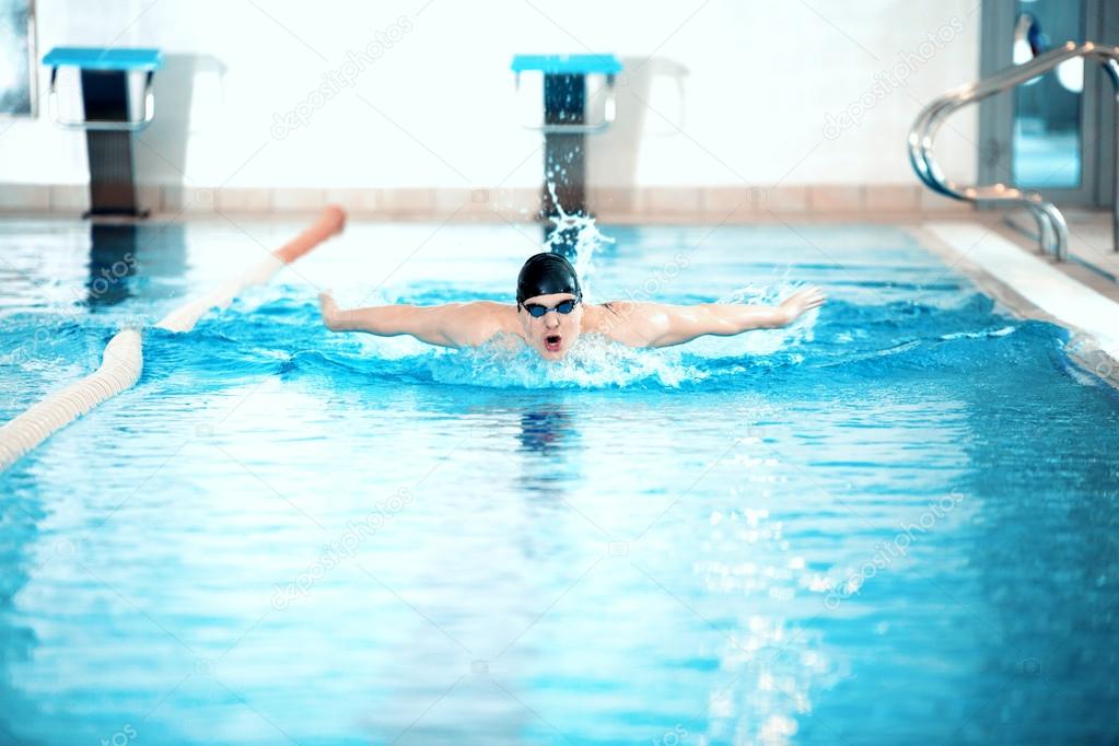 Swimmer performing the butterfly stroke