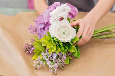 Florist work with flowers