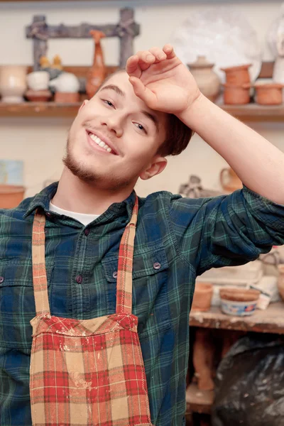 Man cleans his forehead with the hand — Stock Photo, Image