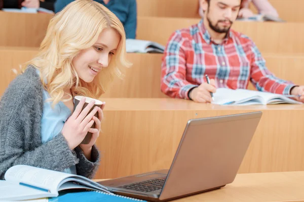 Female student at lecture — Stock Photo, Image