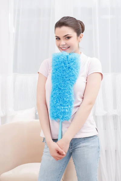 Lady posing with cleaning sweep — Stock Photo, Image