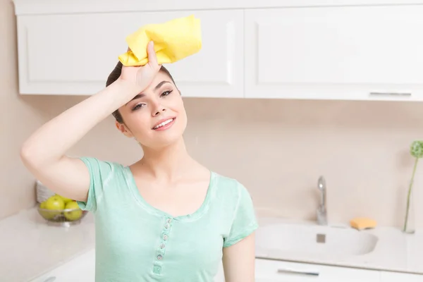 Youthful woman tired in kitchen — Stock Photo, Image