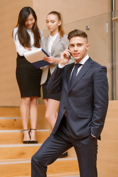 Phone call during the meeting — Stock Photo, Image