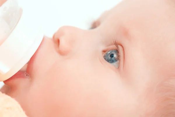 Mother and her  little baby with the bottle — Stock Photo, Image