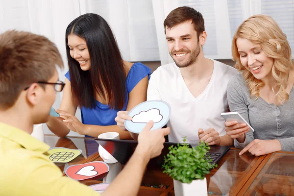 Smart handsome app developer with his team — Stock Photo, Image