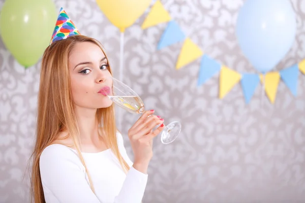 Young girl with glass of champagne — Stock Photo, Image