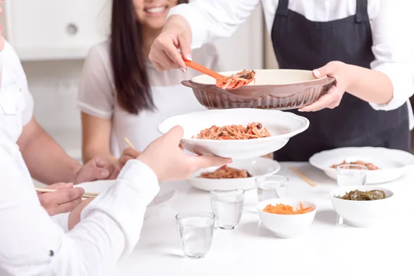 Close-up of modern Asian table with food — Stock Photo, Image