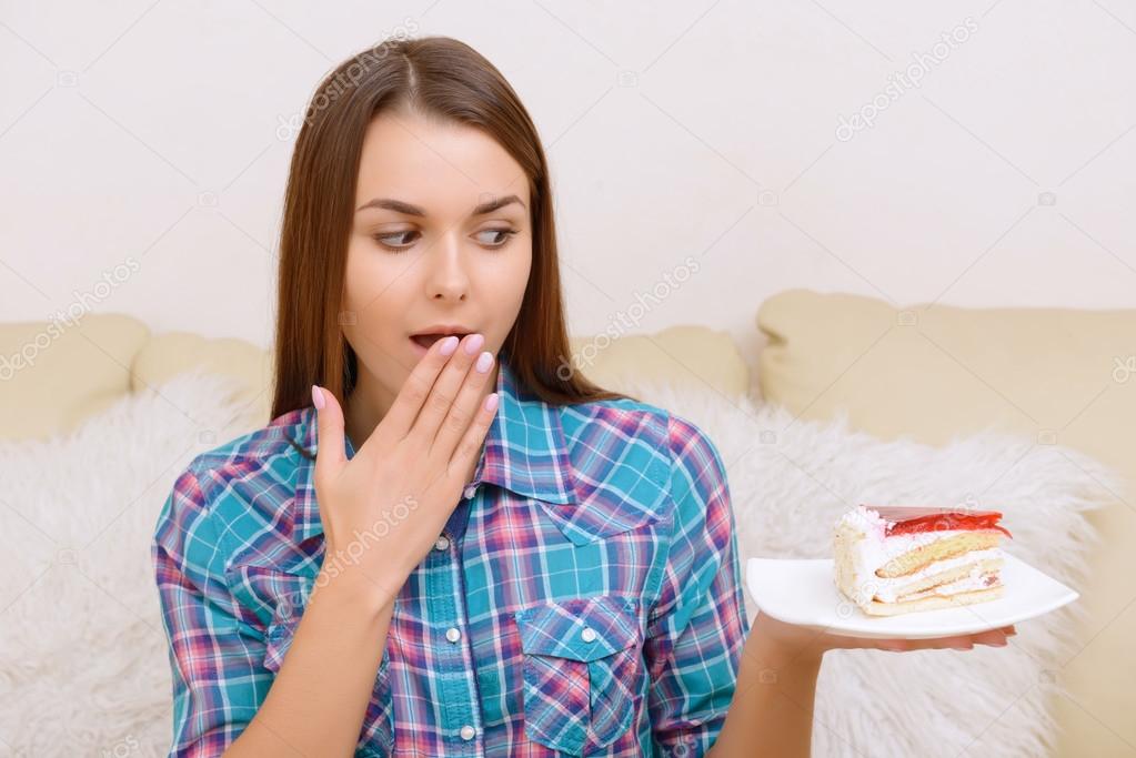 Girl wanting tasty cake.