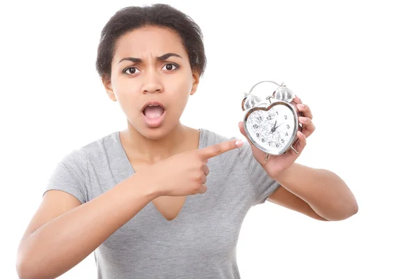 Jovem mulata posando com despertador — Fotografia de Stock