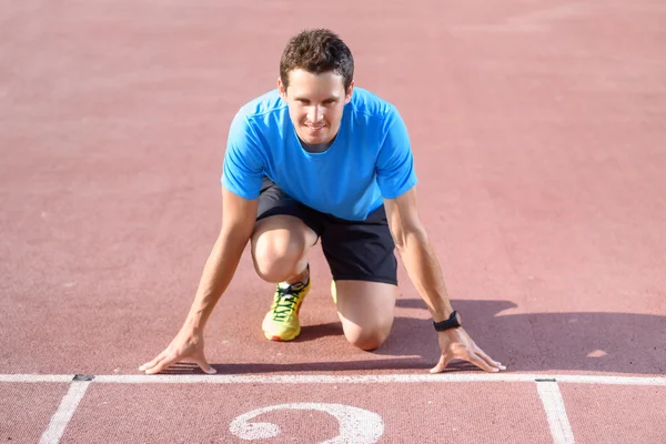 Young sportsman going to run — Stock Photo, Image