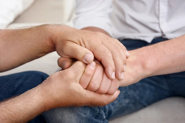 Close up of old and young men hands — Stock Photo, Image