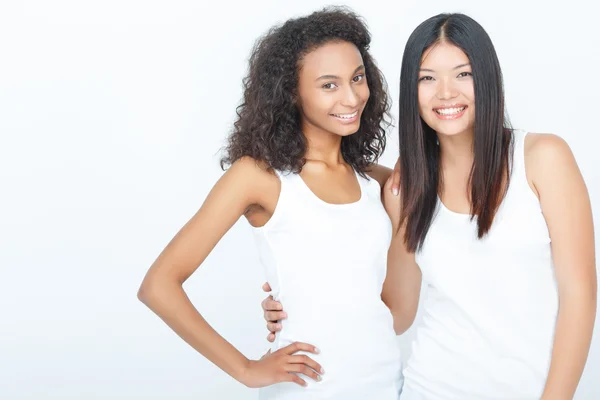 Smiling girls bonding to each other — Stock Photo, Image