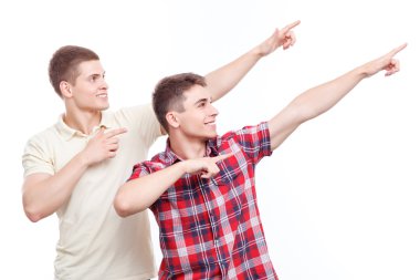 Two handsome men posing on isolated background 