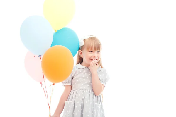 Agradable chica sosteniendo globos —  Fotos de Stock