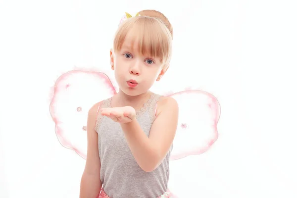 Little pretty girl sending air kisses — Stock fotografie