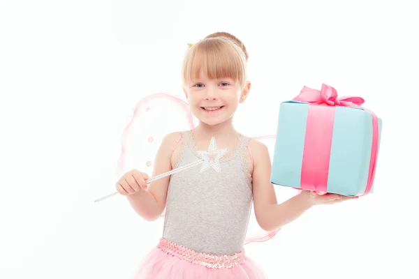 Pleasant little girl holding present — Stok fotoğraf