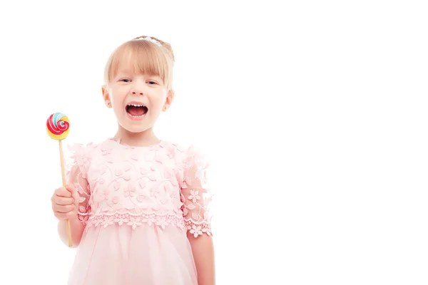 Helles kleines Mädchen mit Lollypop — Stockfoto