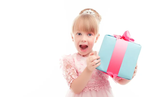 Positive girl holding present box Royalty Free Stock Images