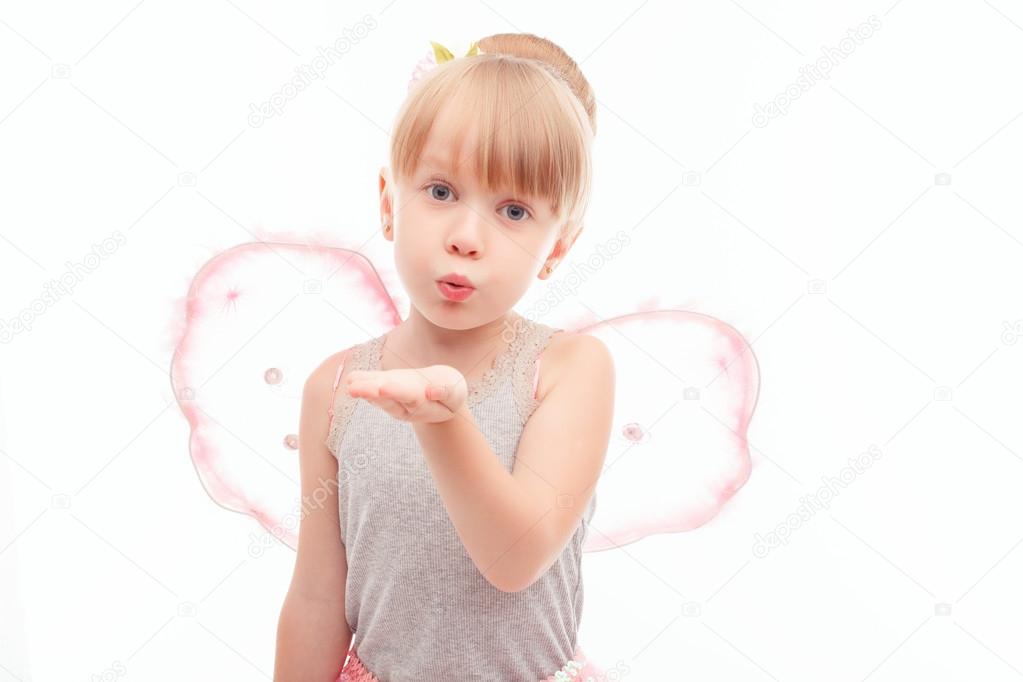 Little pretty girl sending air kisses 