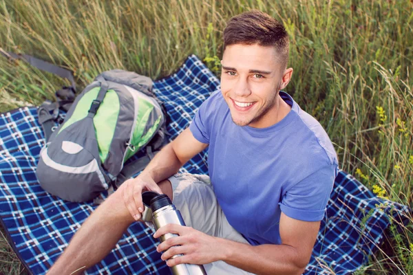 Handsome tourist having rest — Stockfoto