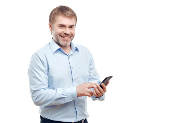 Vivacious man holding mobile phone — Stock Photo, Image