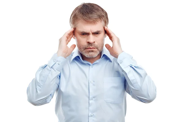 Upset man touching his temples. — Stock Photo, Image