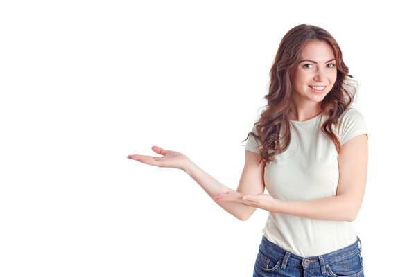 Smiling girl showing aside