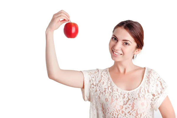 Молодая девушка держит яблоко — стоковое фото