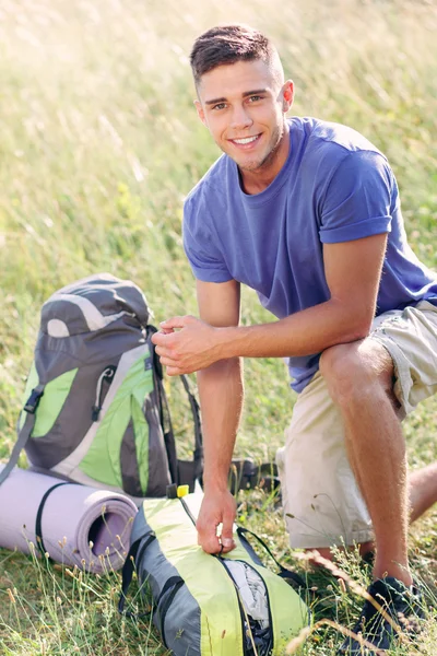 Young tourist in the field — Stock Photo, Image