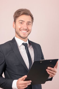 Nice lawyer holding papers 