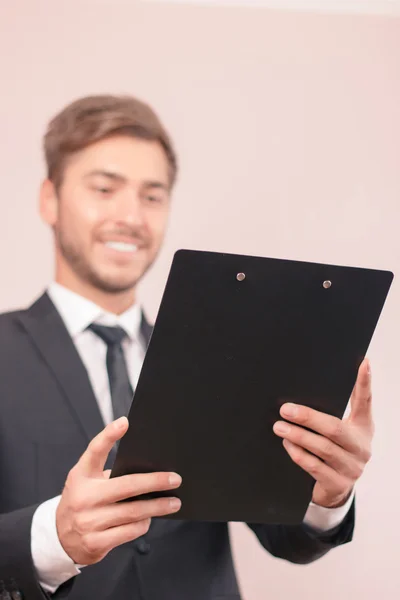 Nice lawyer holding papers — Stock Photo, Image