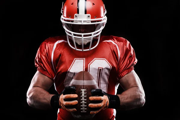 Sportsman holding rugby ball — Stock Photo, Image