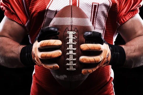 Sportsman holding rugby ball — Stock Photo, Image