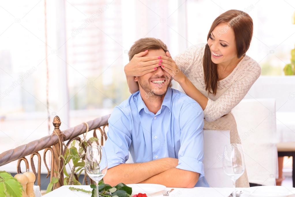 Nice couple sitting at the table