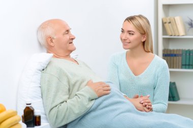 Nice pleasant conversation of two relatives at hospital.