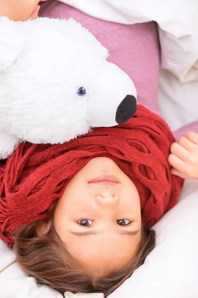 Little girl lying in bed — Stock Photo, Image