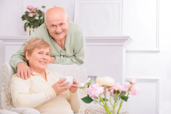 Happy couple resting at home — Stock Photo, Image