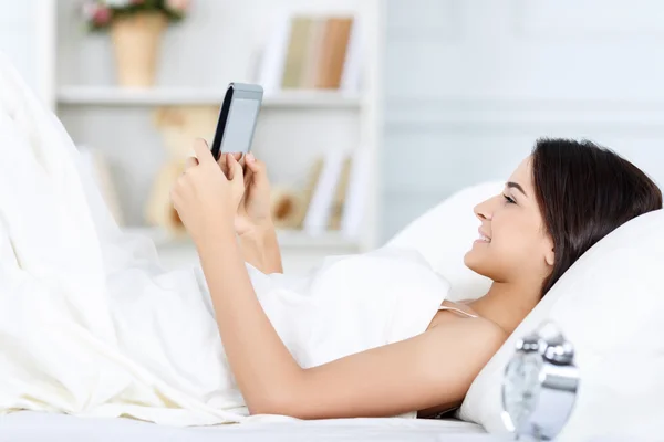 Pleasant girl  holding laptop — Stock Photo, Image