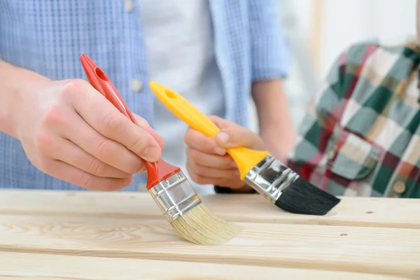 Happy father and son making renovation — Stock Photo, Image