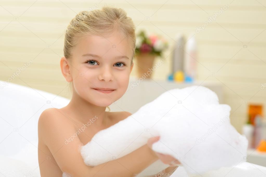 Photo Of Young Nude Woman In A Steamy Brightly Lit Bathroom