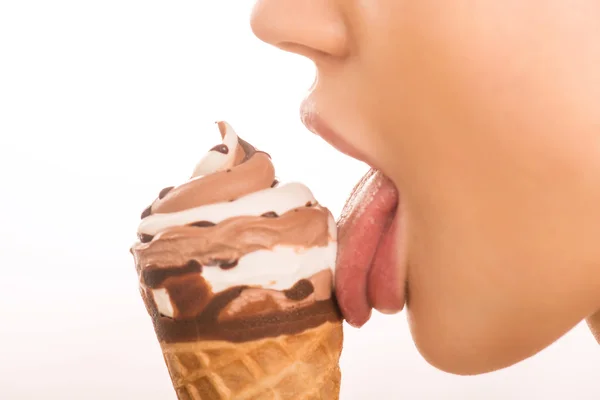 Young girl licking an ice cream. — Stock Photo, Image