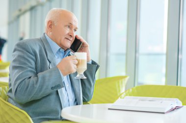 man resting at the cafeteria.
