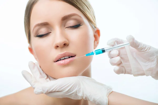 Professional cosmetologist making injections — Stock Photo, Image